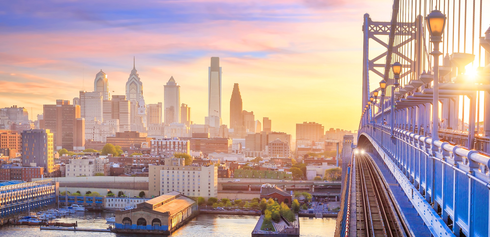 Panorama of Philadelphia skyline, Ben Franklin Bridge and Penn's Landing sunset